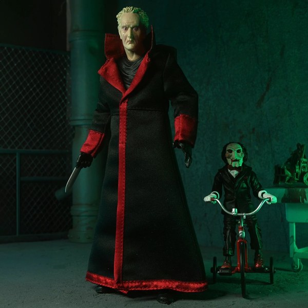 SAW (FRANCHISE) - 7" SCHAAL ACTIEFIGUUR - ULTIMATE JIGSAW KILLER (BLACK ROBE)
