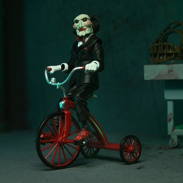 SAW (FRANCHISE) - 7" SCHAAL ACTIEFIGUUR - ULTIMATE JIGSAW KILLER (BLACK ROBE)