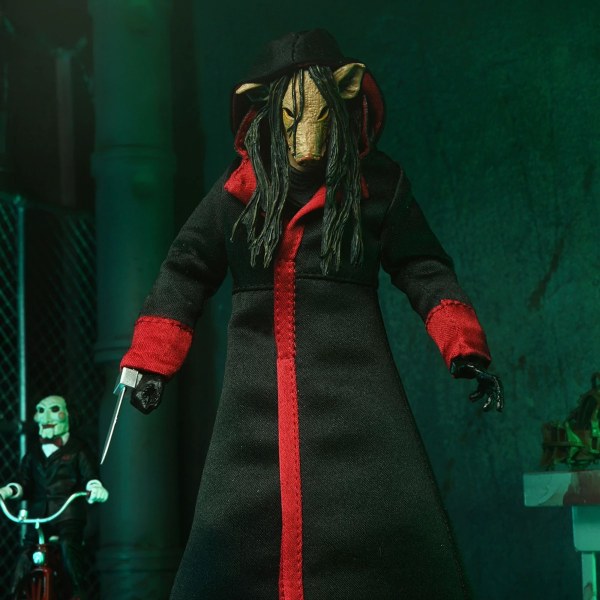 SAW (FRANCHISE) - 7" SCHAAL ACTIEFIGUUR - ULTIMATE JIGSAW KILLER (BLACK ROBE)