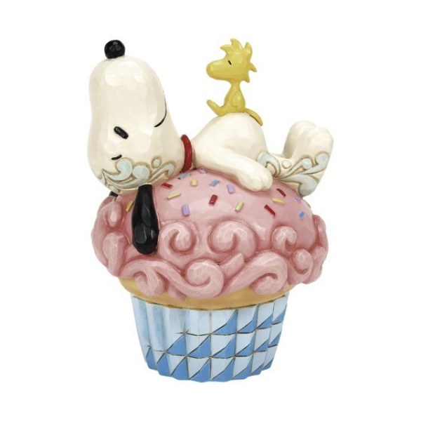 Snoopy ligt op cupcake - Peanuts