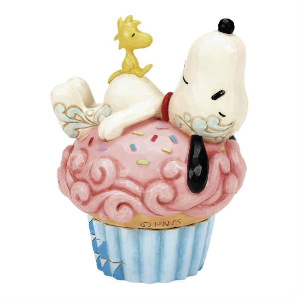 Snoopy ligt op cupcake - Peanuts