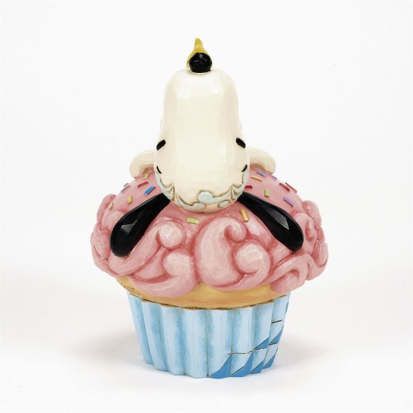 Snoopy ligt op cupcake - Peanuts