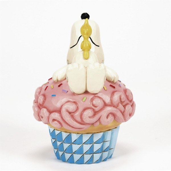 Snoopy ligt op cupcake - Peanuts