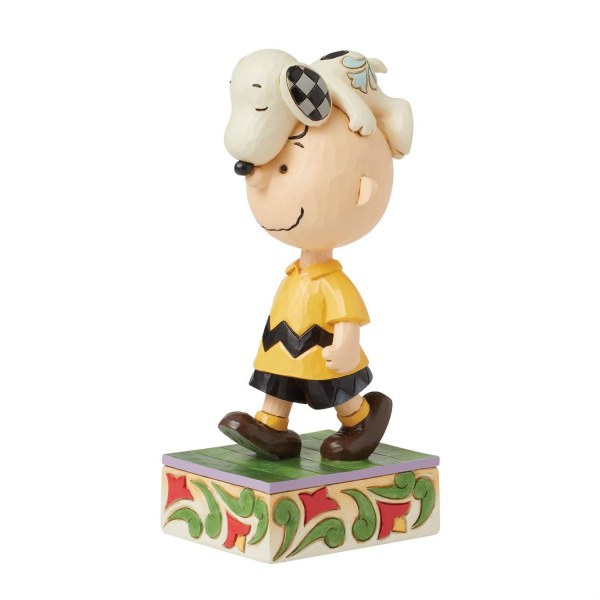Snoopy op Charlie Browns hoofd - Peanuts