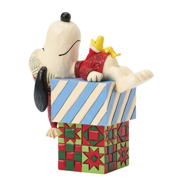 Snoopy en Woodstock slapen op cadeautjes - Peanuts