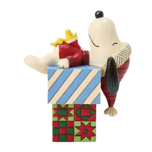 Snoopy en Woodstock slapen op cadeautjes - Peanuts
