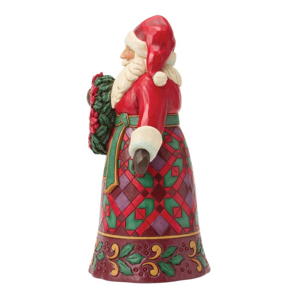 Kerstman met poinsettia-figuur - Heartwood Creek